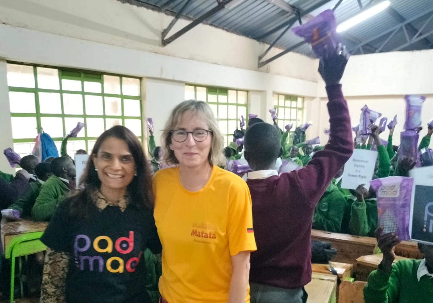 PadMad Director, Madhvi Dalal and Hakuna Matata Foundation Director, Uteh Simon stand together during a partnership engagement advancing inclusive menstrual health conversations, at St. Peter’s Iten. Photo by: PadMad